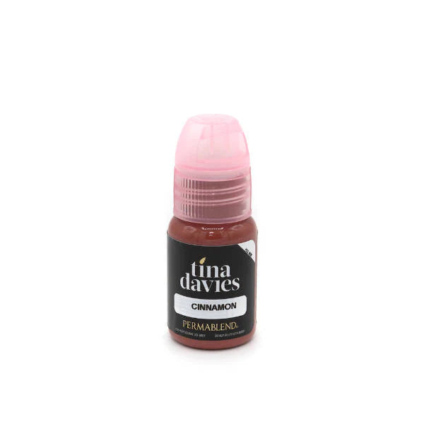 Bottle of Tina Davies Cinnamon paint on a white background