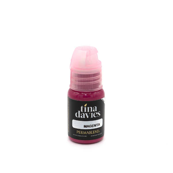 Bottle of Tina Davies magenta paint on a white background