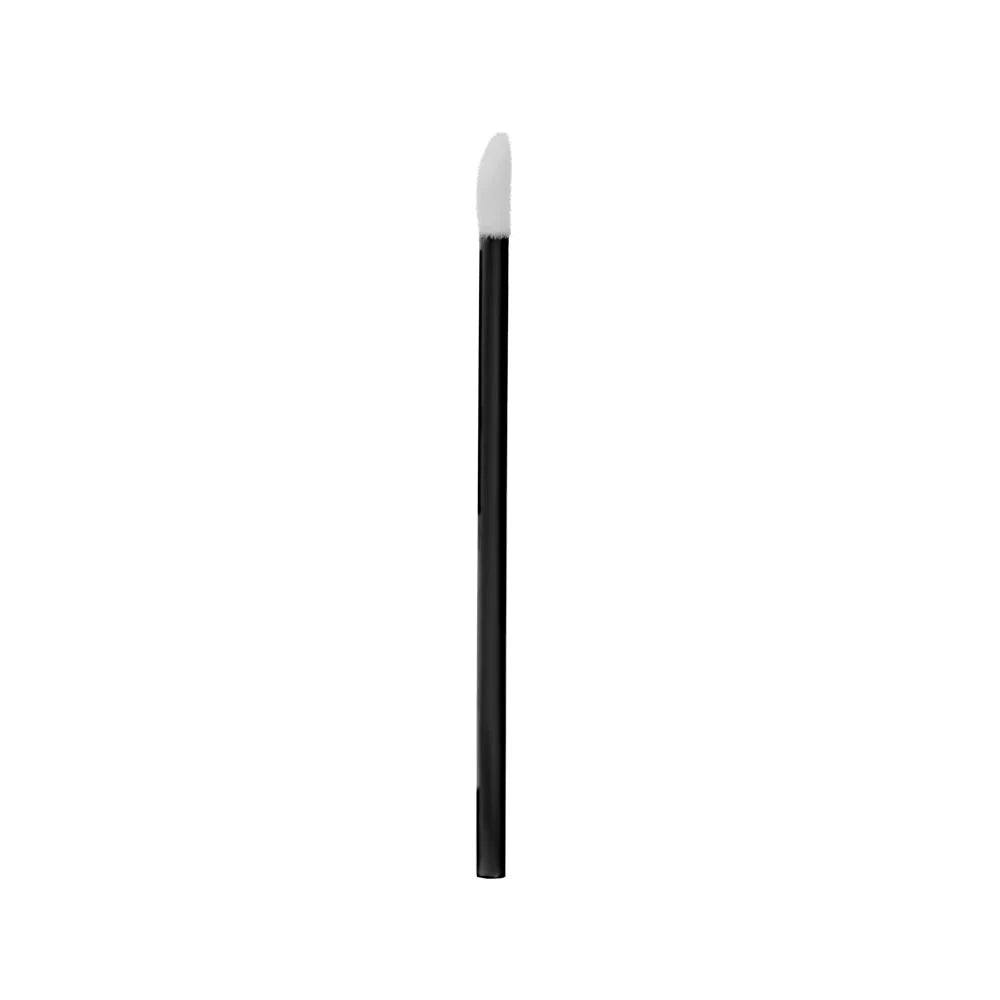 Black lip applicator brush with white bristle tip on a white background