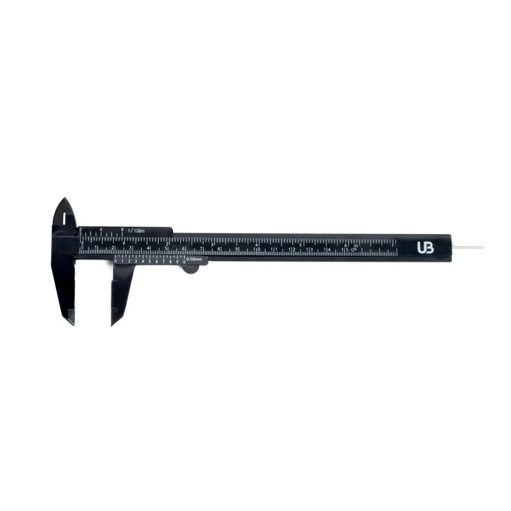 Black vernier caliper with 'UB' branding on a white background
