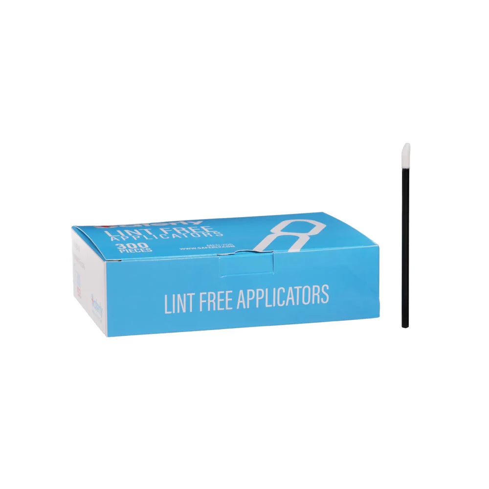 Box of lint-free applicators with a single applicator on a white background