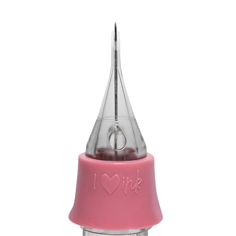Pink tattoo needle cartridge with 'I ❤️ ink' text on a white background